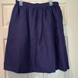 Women’s navy skirt with gold dots. New with tags.
